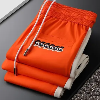 Летние тонкие ледяные оранжевые спортивные повседневные брюки для мужчин, приталенный крой, Быстросохнущие леггинсы в мягкую полоску с боков для мужчин